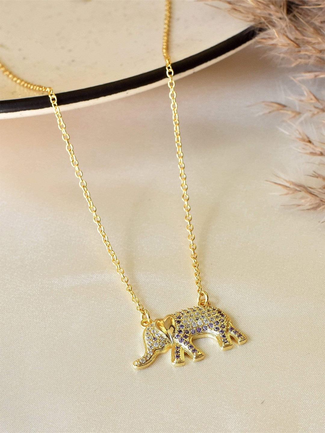 

Klissaa Gold-Toned White Brass Gold-Plated White Haathi Necklace