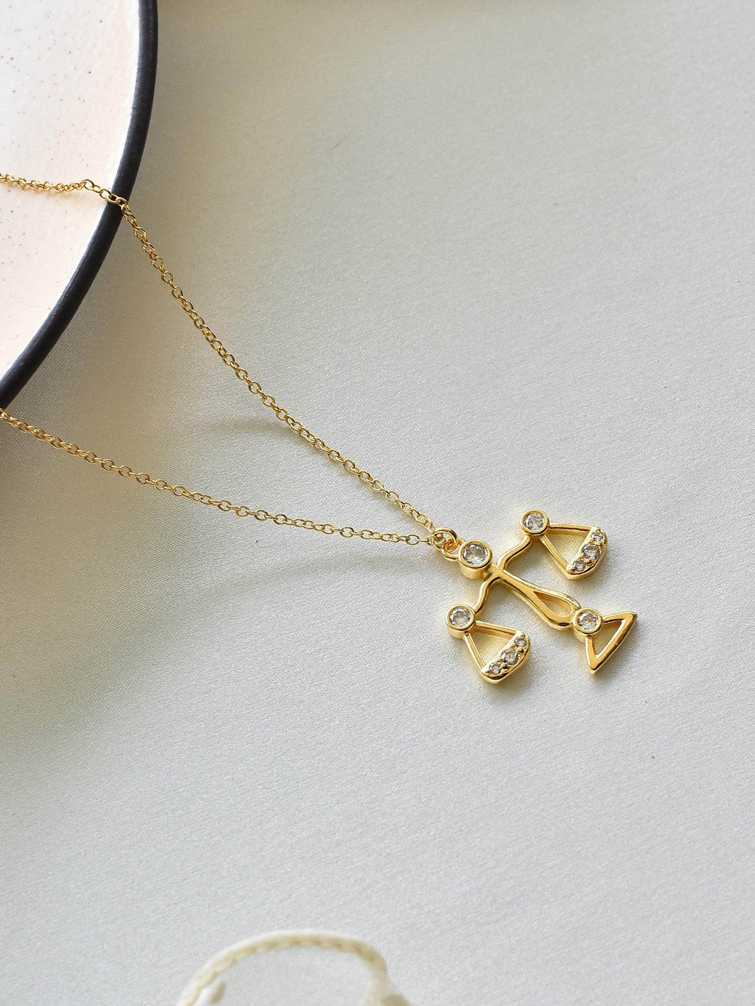 

Klissaa Gold-Toned White Brass Gold-Plated Libra Zodiac Necklace