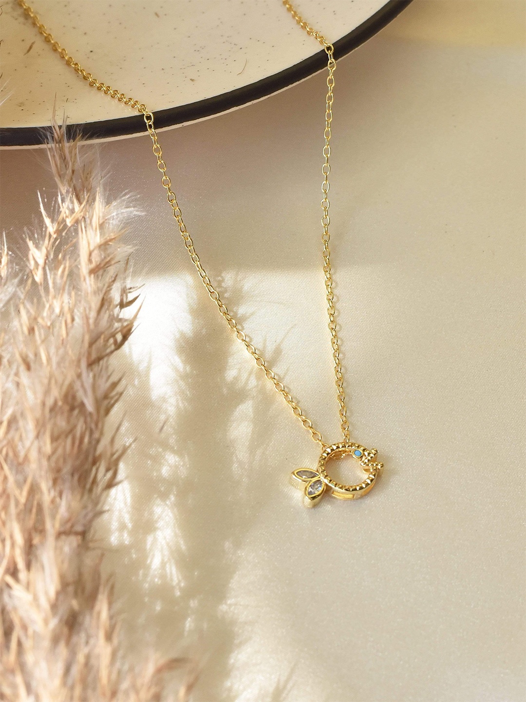 

Klissaa Gold-Toned White Brass Fish Pendant Necklace