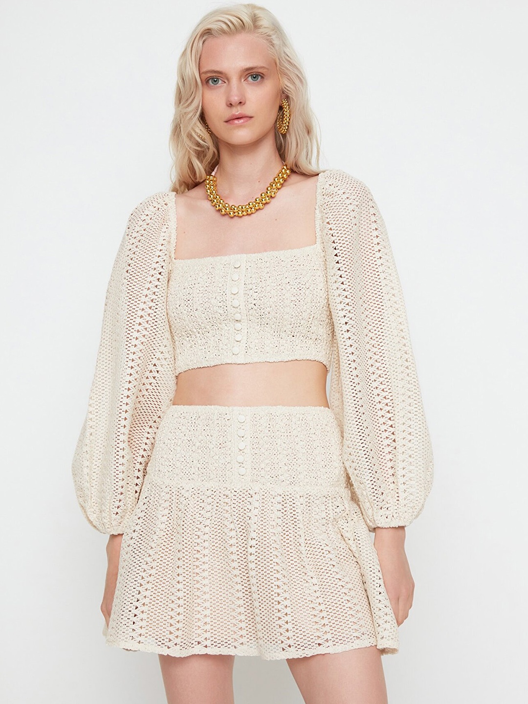 

Trendyol Women Beige Solid Mini Flared Skirts