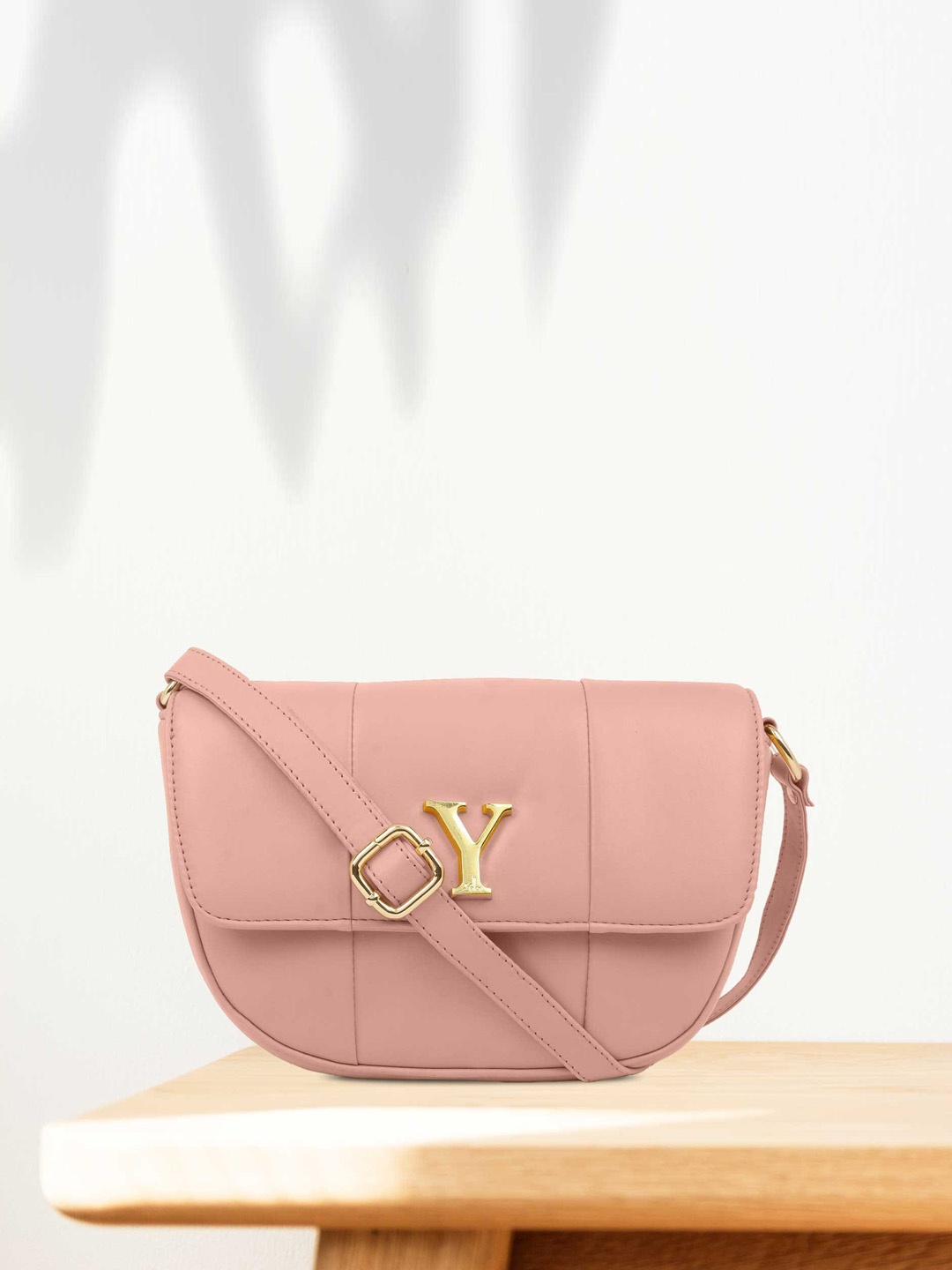 

yelloe Women Pink Solid Half Moon Sling Bag