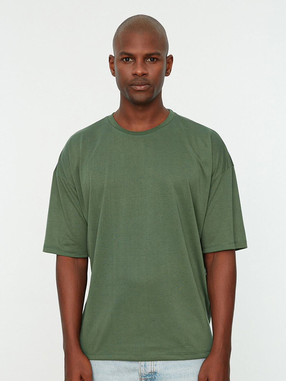 

Trendyol Men Green Solid Drop-Shoulder Sleeves Polyester T-shirt