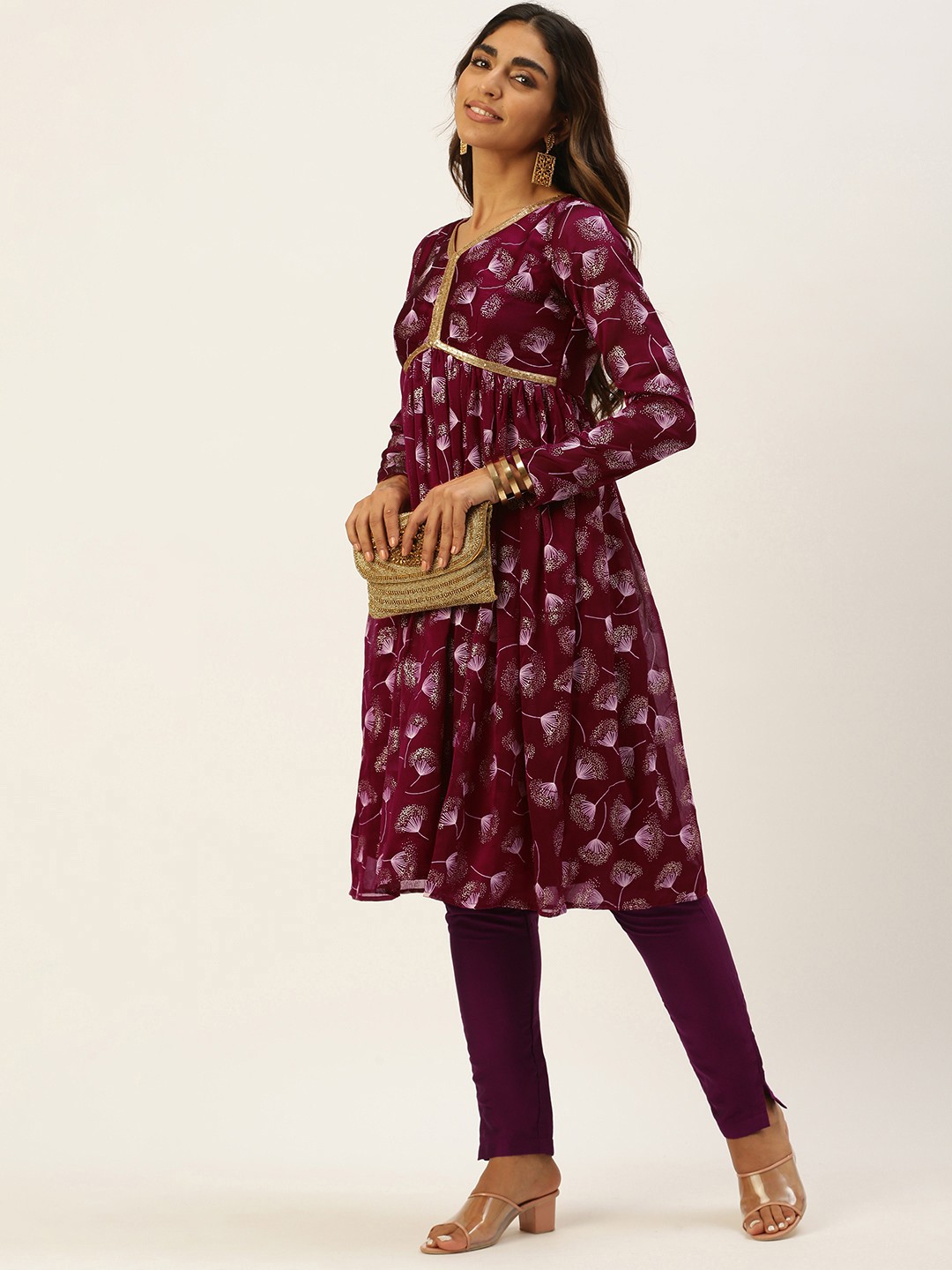 

Ethnovog Women Maroon Floral Printed Kurta with Trousers