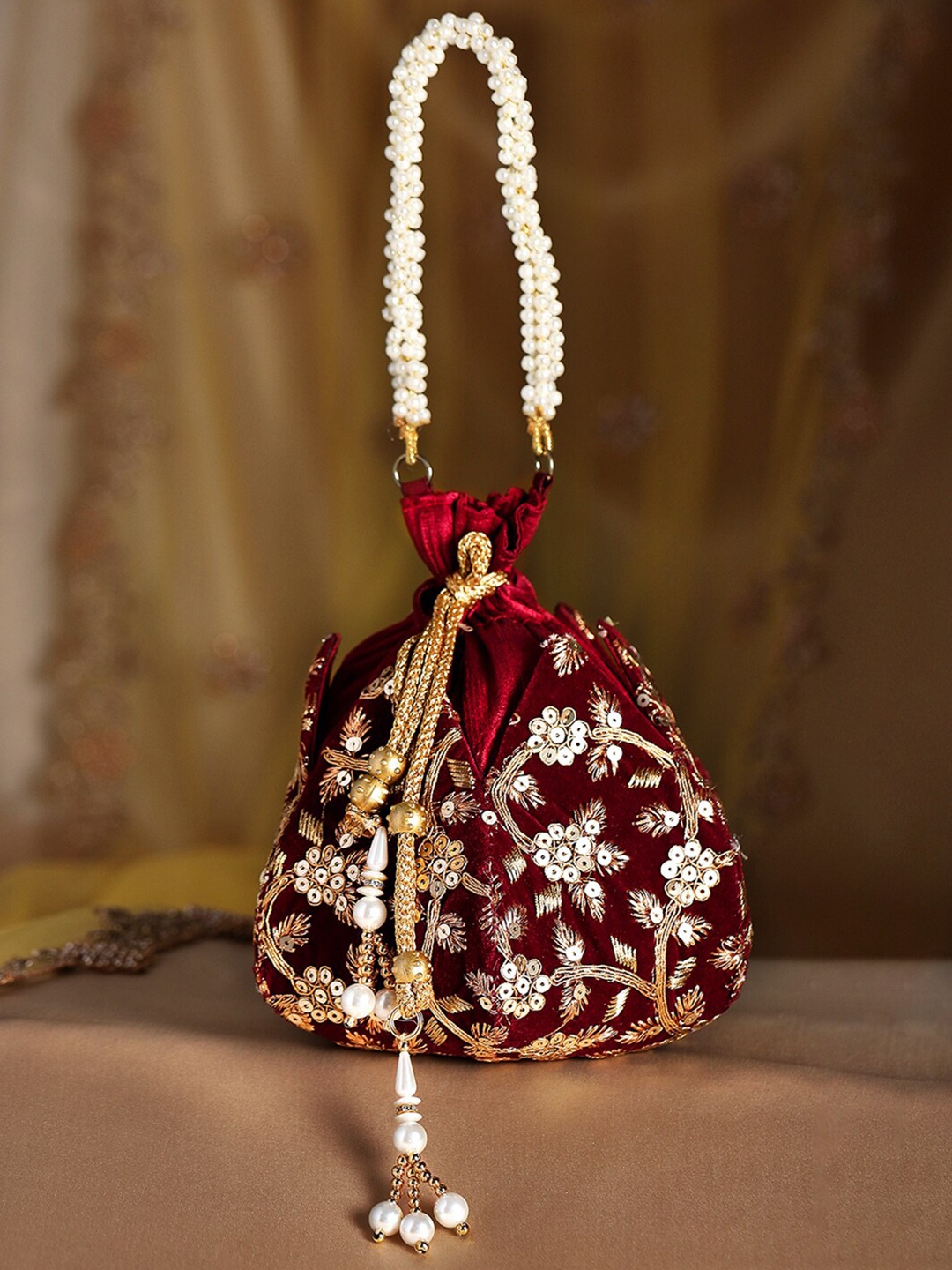 

Rubans Red & Gold-Toned Embellished Potli Clutch