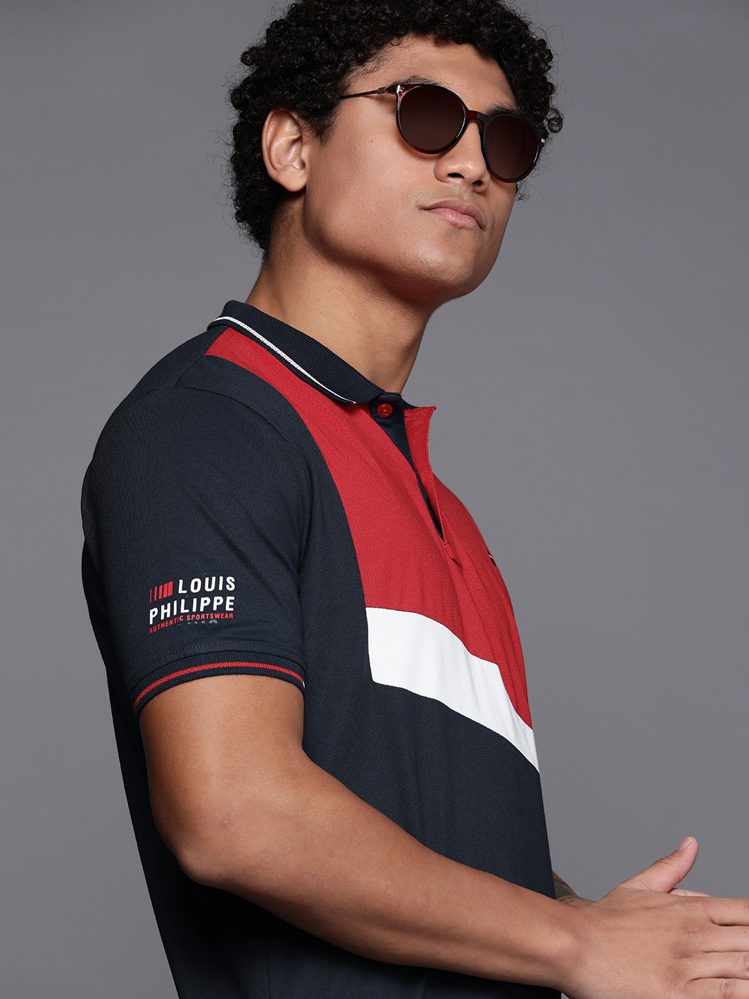 

Louis Philippe Sport Men Navy Blue & Red Colourblocked Polo Collar T-shirt