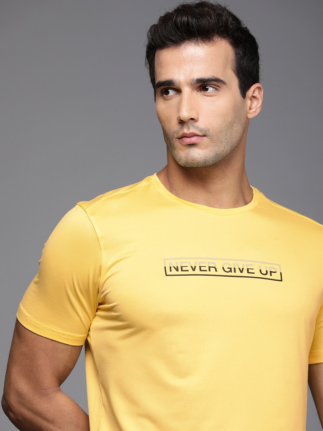 

Louis Philippe ATHPLAY Men Yellow Brand Logo Printed Slim Fit T-shirt