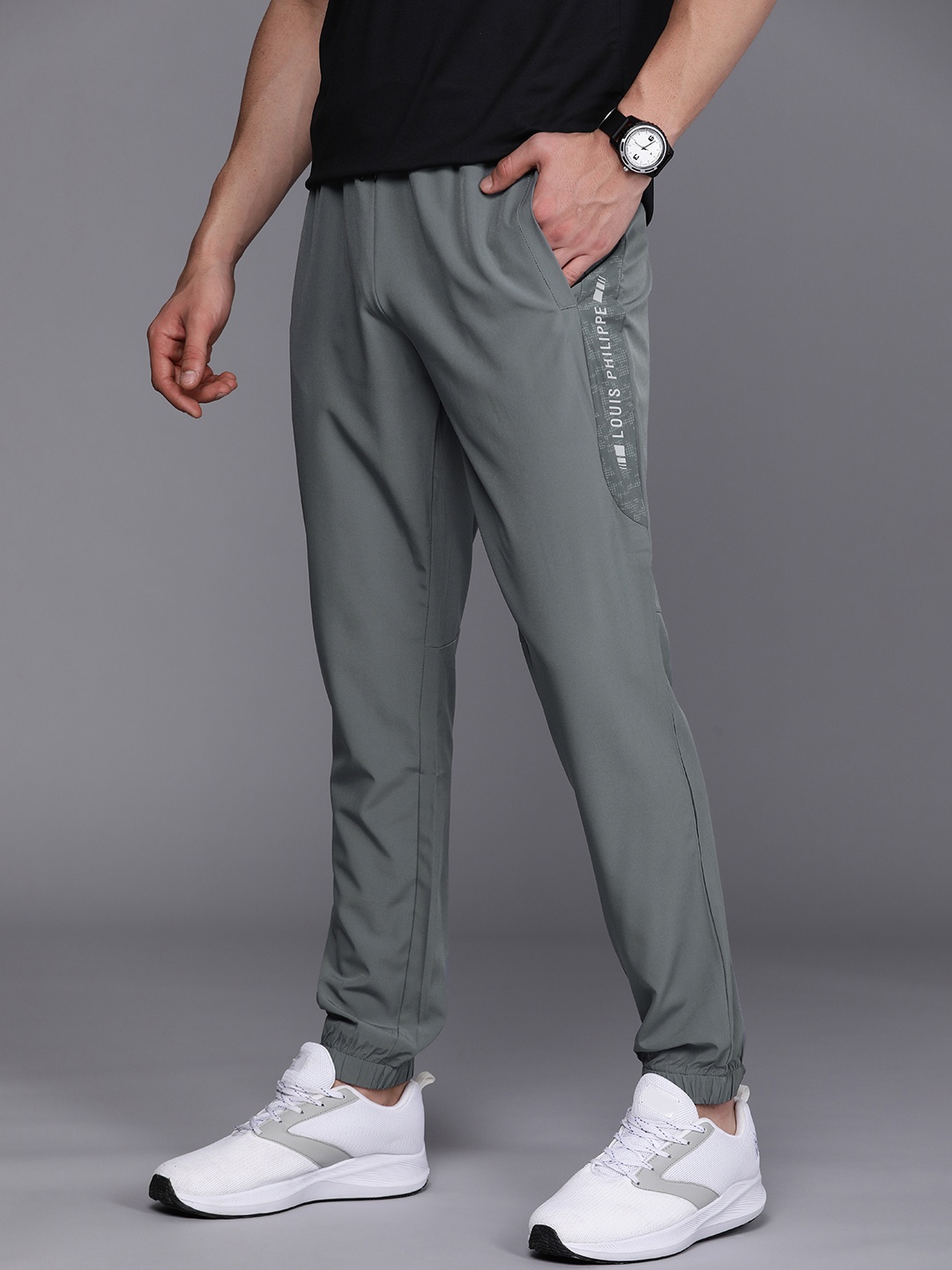 

Louis Philippe ATHPLAY Men Grey Brand Logo Printed Jogger Track Pants