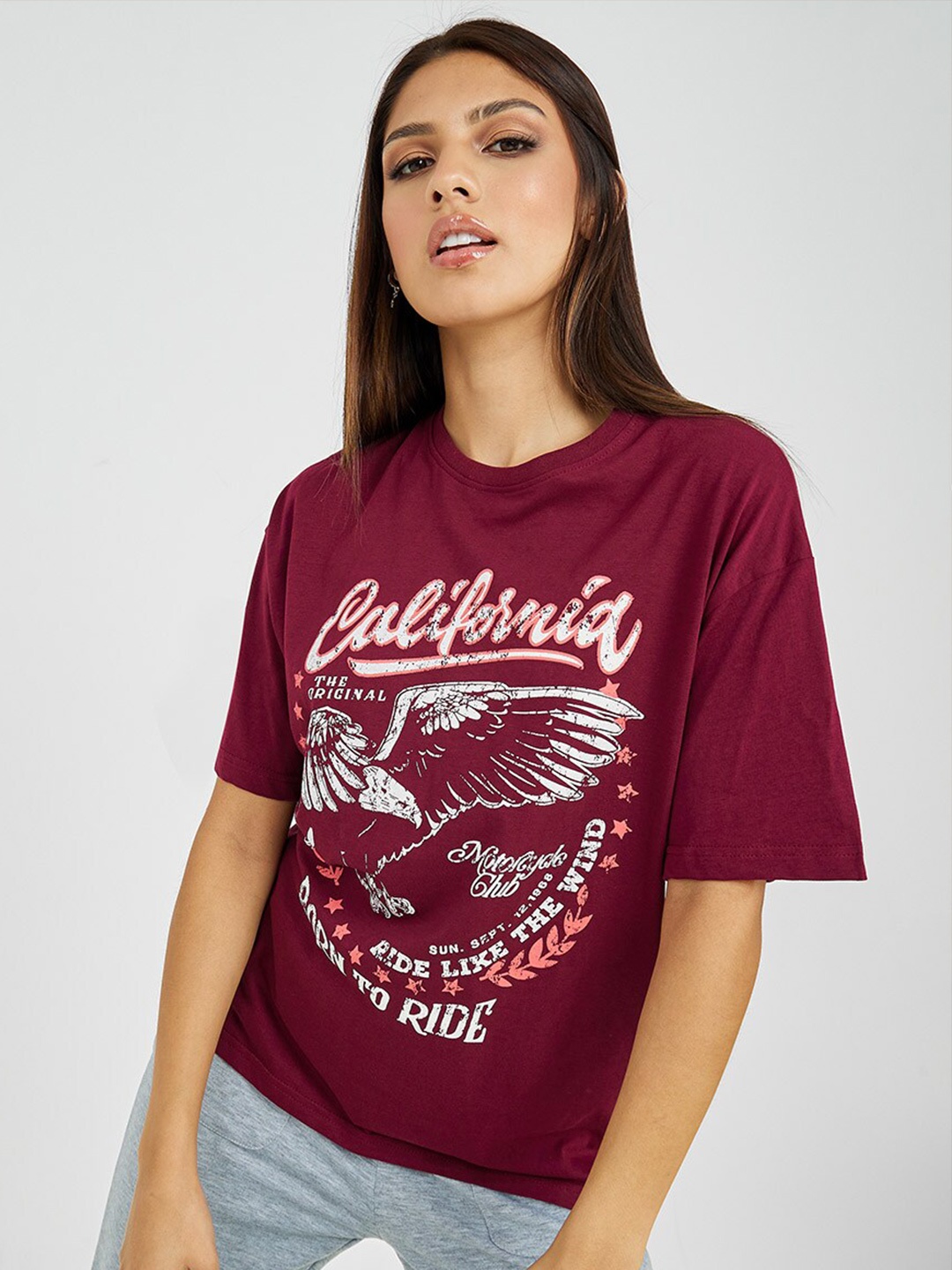 

Styli Women California Eagle Printed Oversized Longline T-shirt, Burgundy