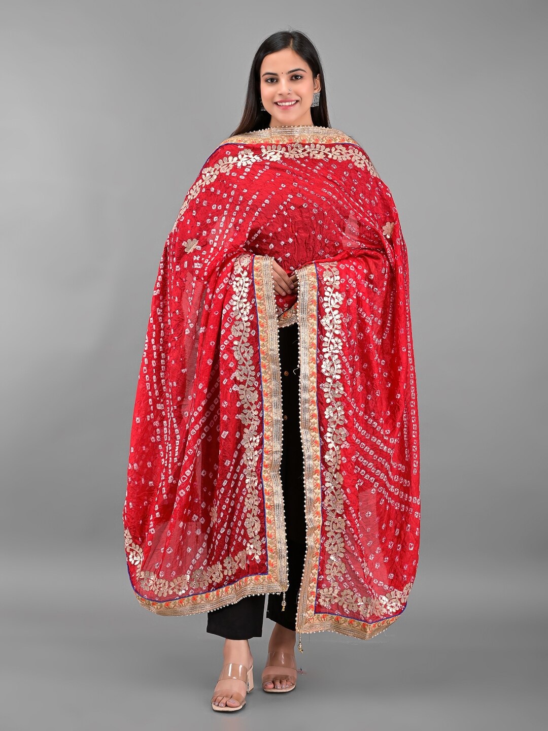 

Apratim Red & White Printed Art Silk Bandhani Dupatta with Gotta Patti