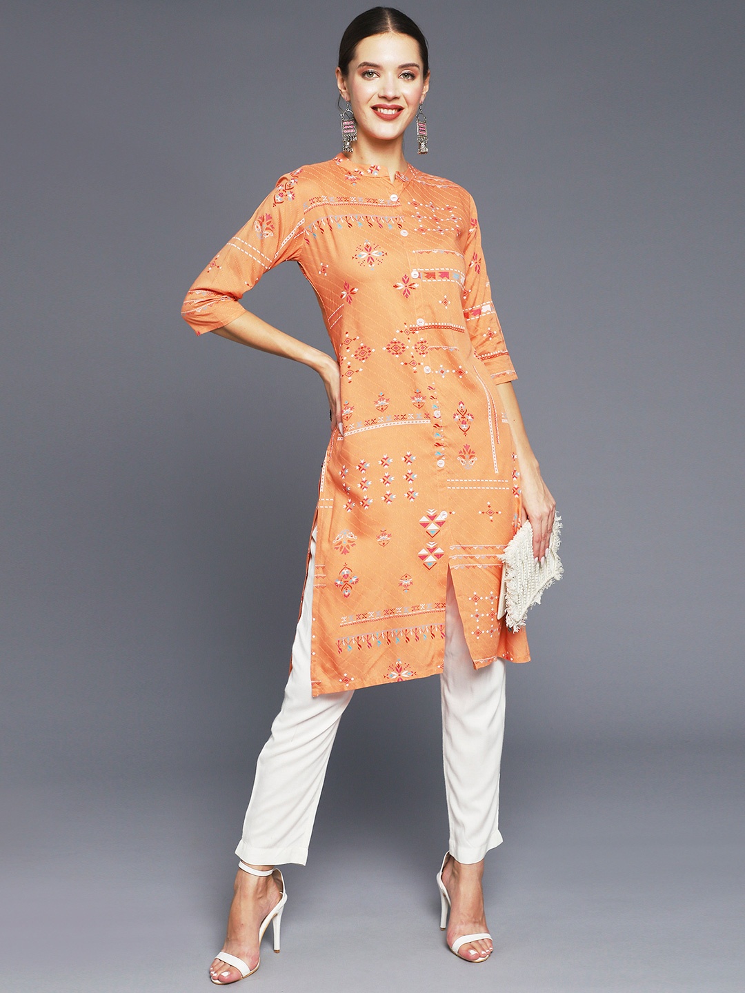 

Anubhutee Women Orange Floral Printed Gotta Patti Kurta