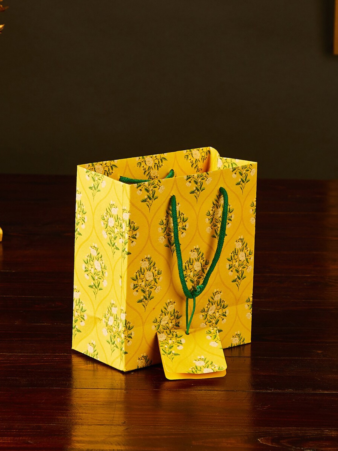 

Home Centre Yellow Corsica Bela Printed Paper Gift Bag with Tag