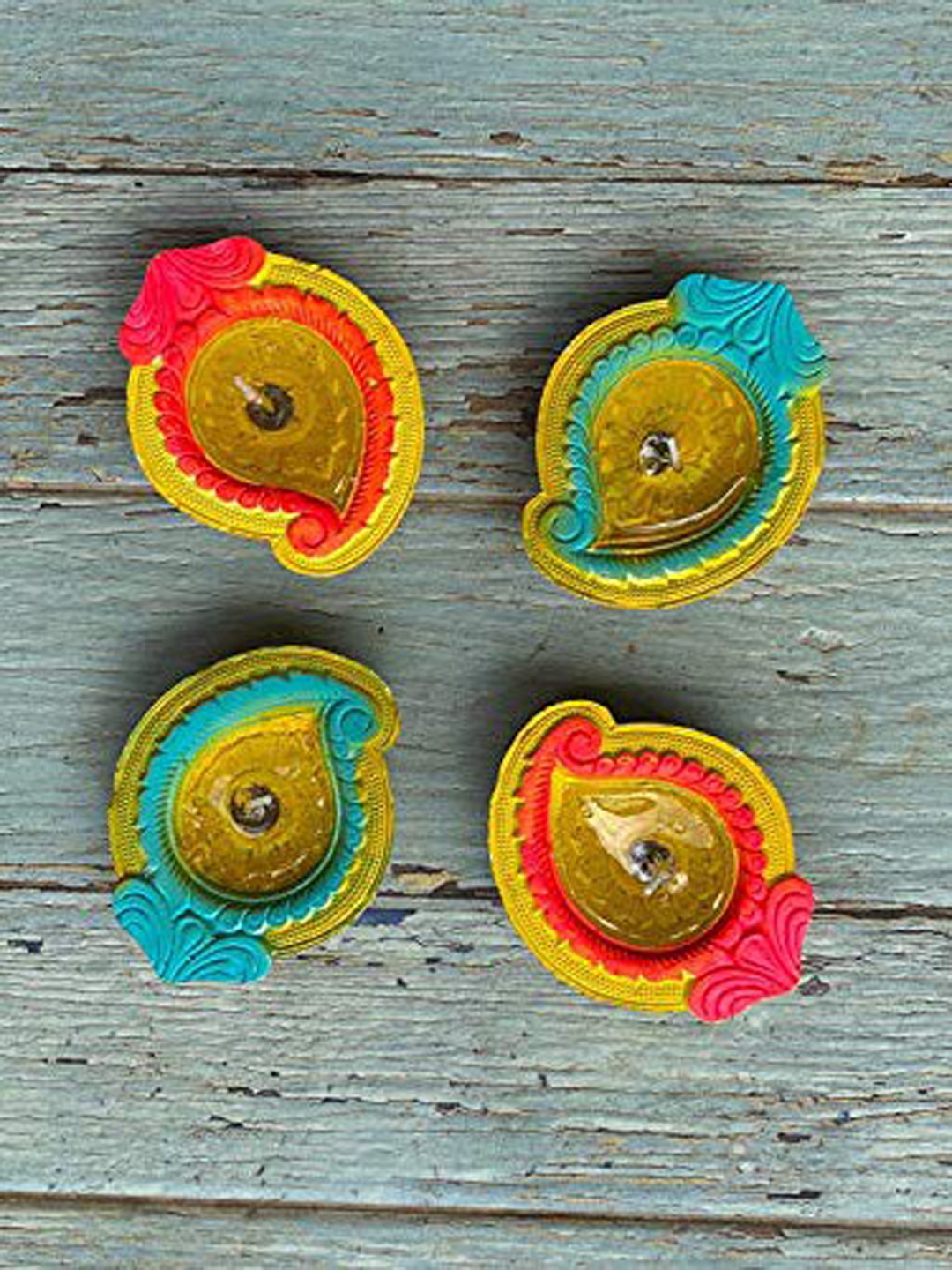

Ariana Set Of 4 Yellow Printed Modern Diya