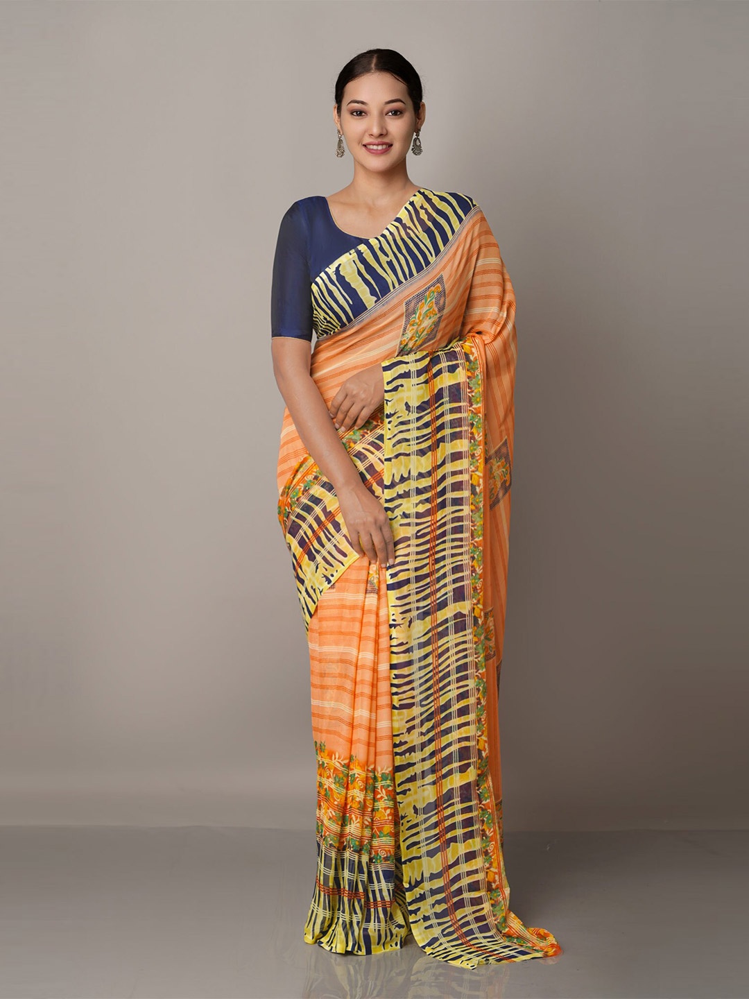 

Unnati Silks Orange & White Floral Bandhani Saree