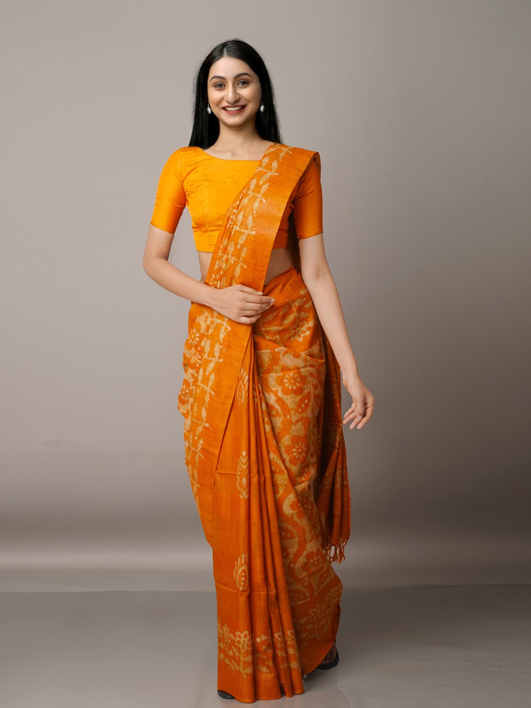 

Unnati Silks Orange & Off White Batik Silk Cotton Bhagalpuri Saree