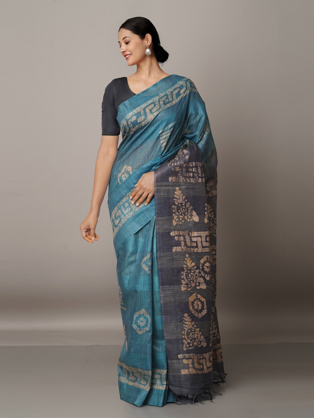 

Unnati Silks Teal & Beige Batik Silk Cotton Bhagalpuri Saree