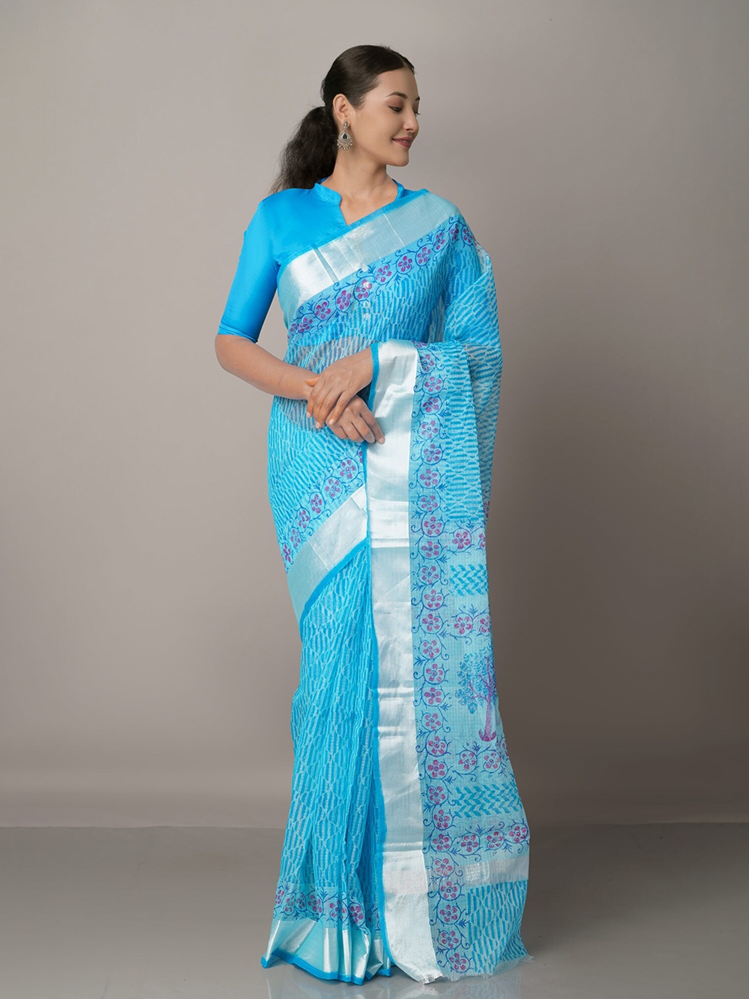 

Unnati Silks Blue & Silver-Toned Floral Zari Pure Cotton Kota Saree