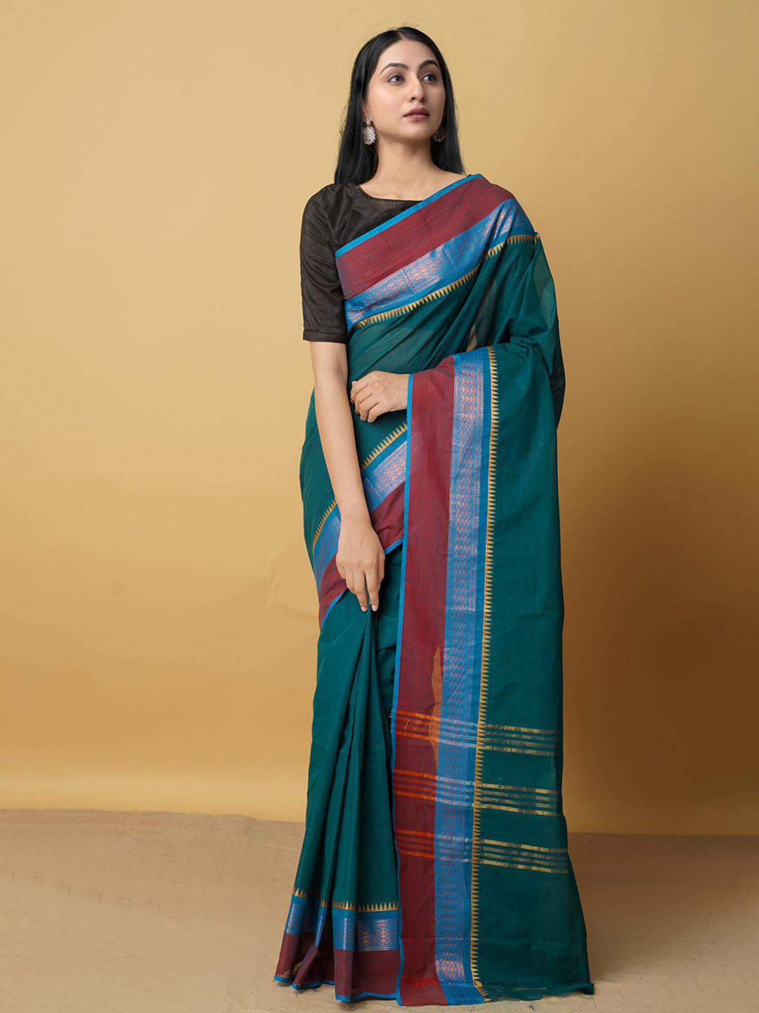

Unnati Silks Women Green & Blue Pure Solid Cotton Kanjeevaram Saree
