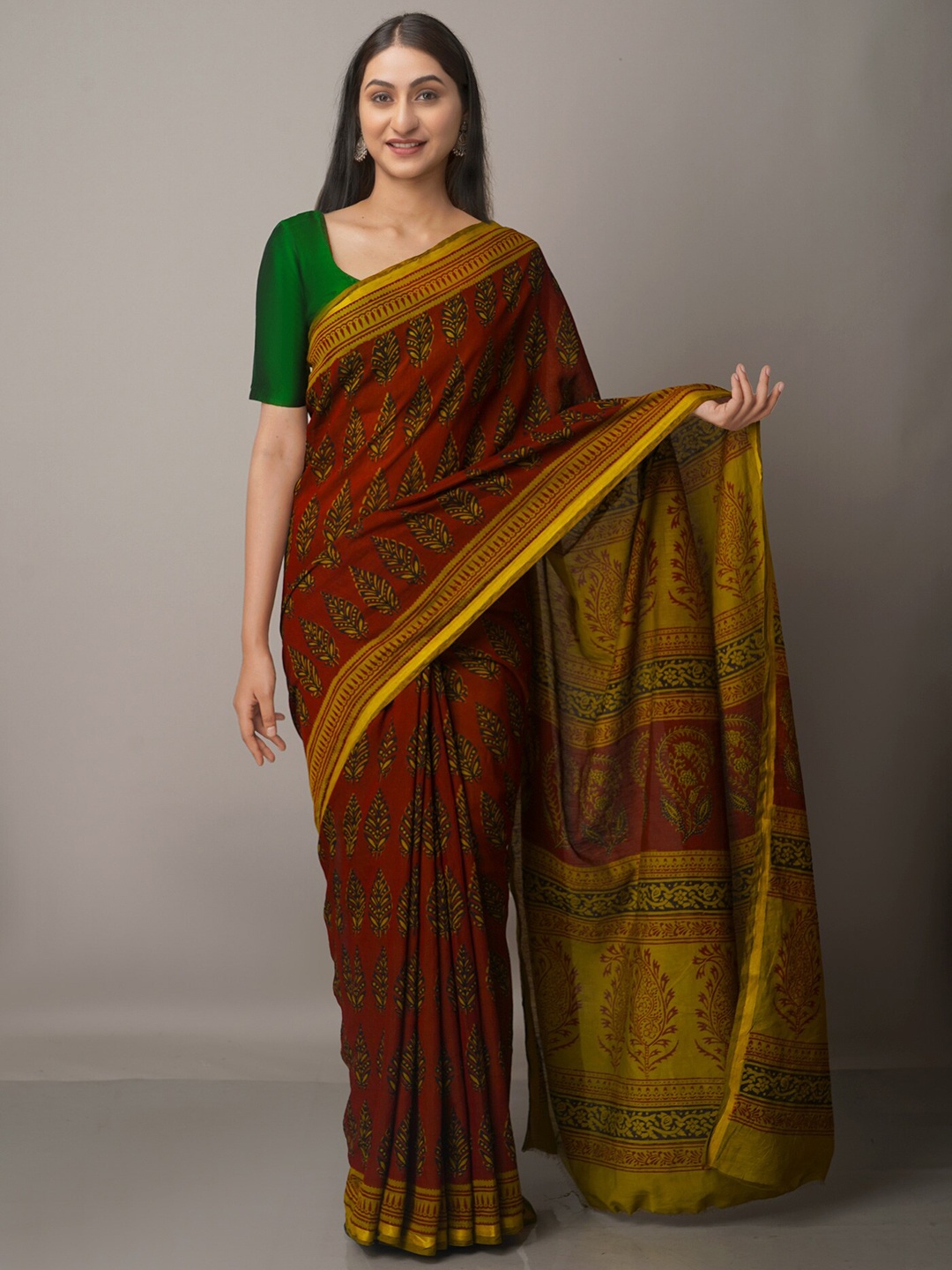 

Unnati Silks Maroon & Green Ethnic Motifs Zari Pure Cotton Chanderi Saree