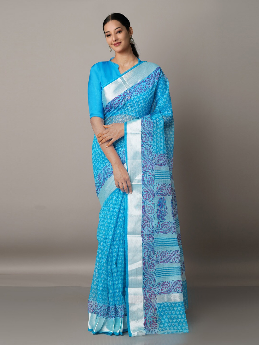 

Unnati Silks Blue & Silver-Toned Ethnic Motifs Zari Pure Cotton Kota Saree