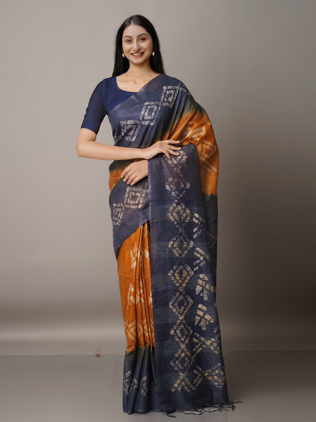 

Unnati Silks Orange & Blue Batik Silk Cotton Bhagalpuri Saree