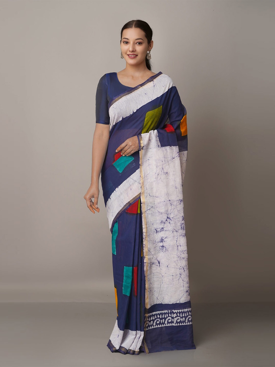 

Unnati Silks Navy Blue & Gold-Toned Batik Zari Silk Cotton Chanderi Saree