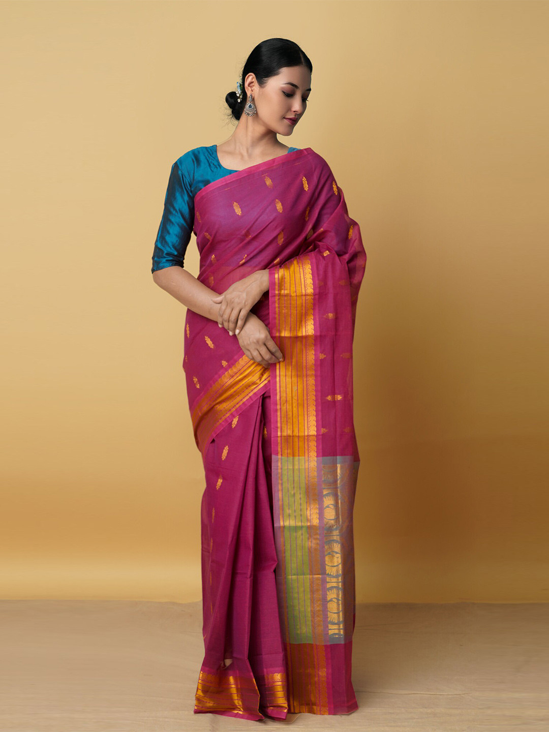 

Unnati Silks Pink & Green Woven Design Zari Pure Cotton Venkatgiri Saree
