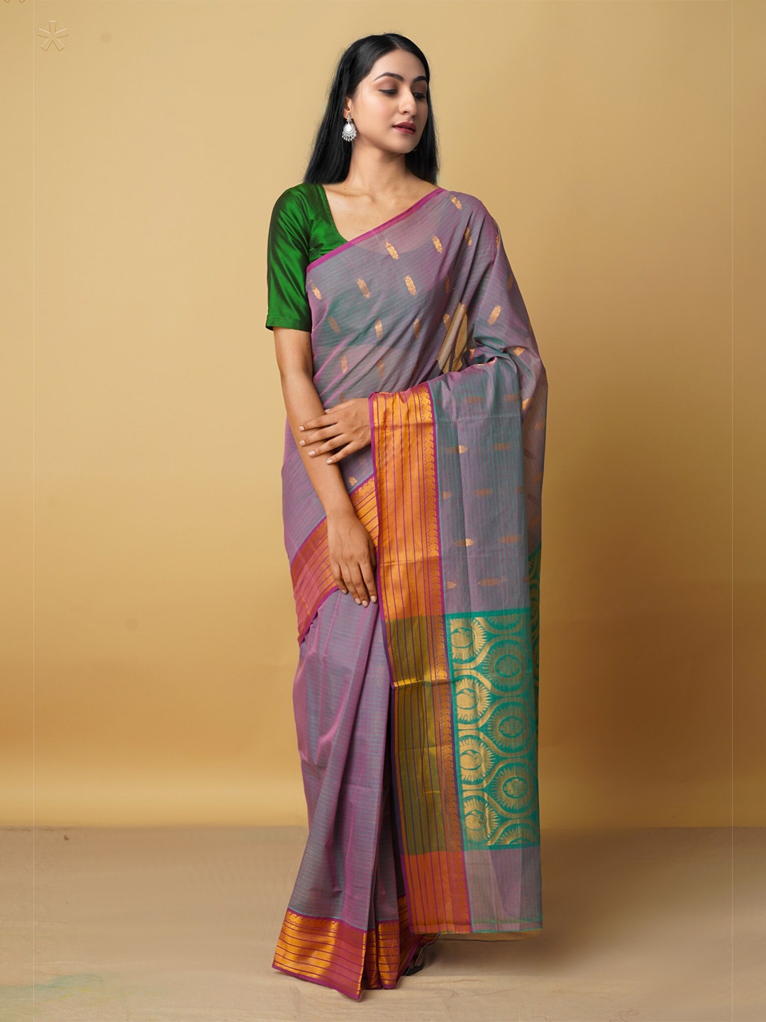 

Unnati Silks Green & Purple Woven Design Zari Pure Cotton Venkatgiri Saree