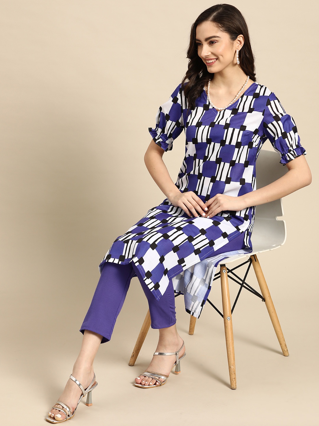 

Sangria Women Purple Printed Kurta with Trousers
