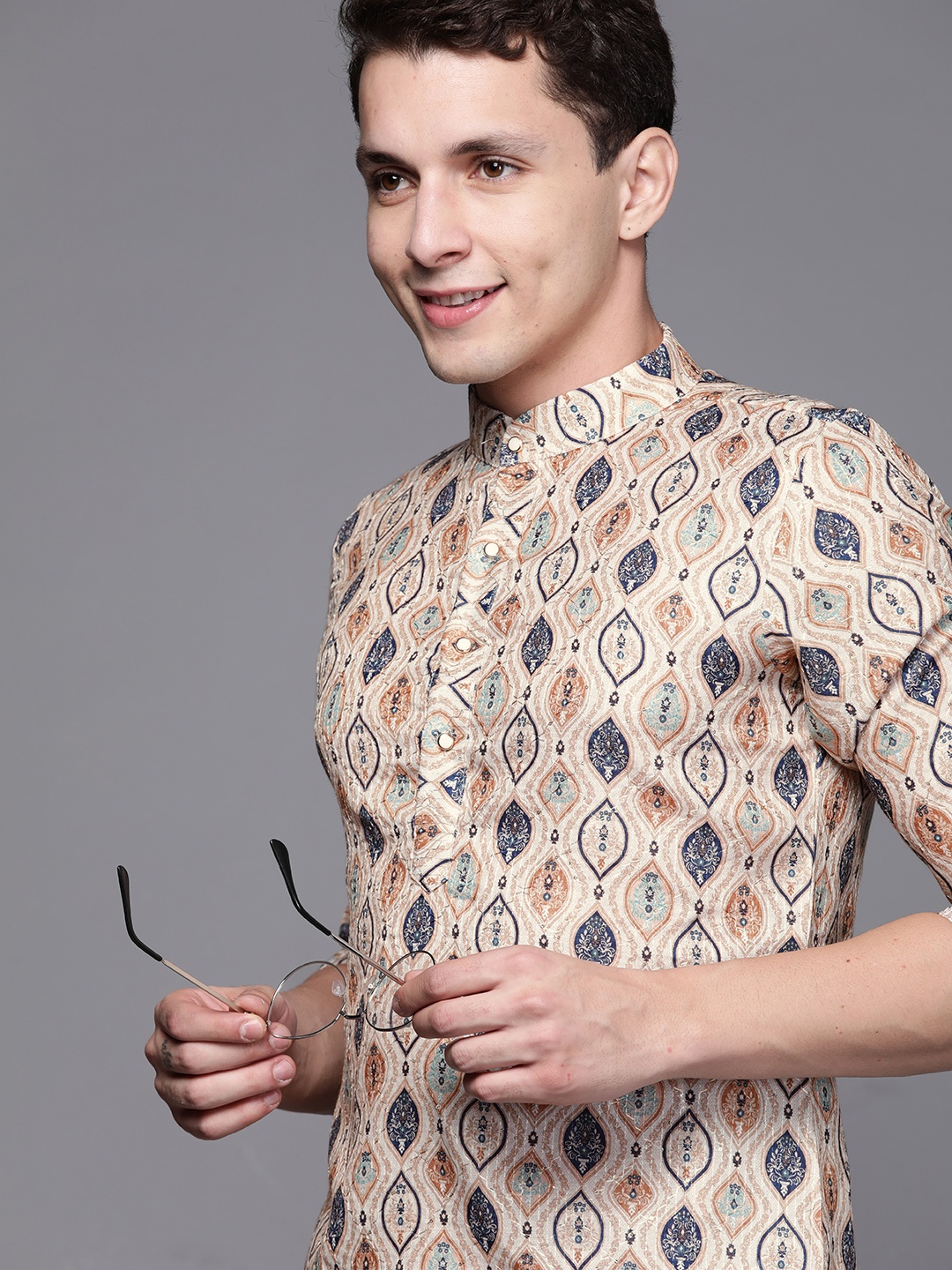 

Indo Era Men Beige & Navy Blue Ethnic Motifs Printed Kurta