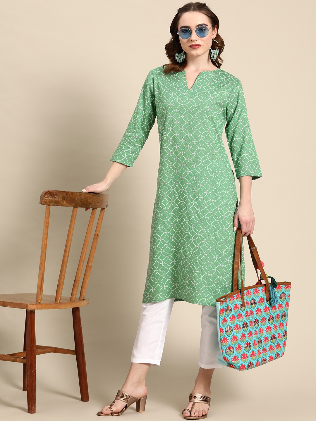 

Sangria Ethnic Motifs Printed Pastel Straight Kurta, Green
