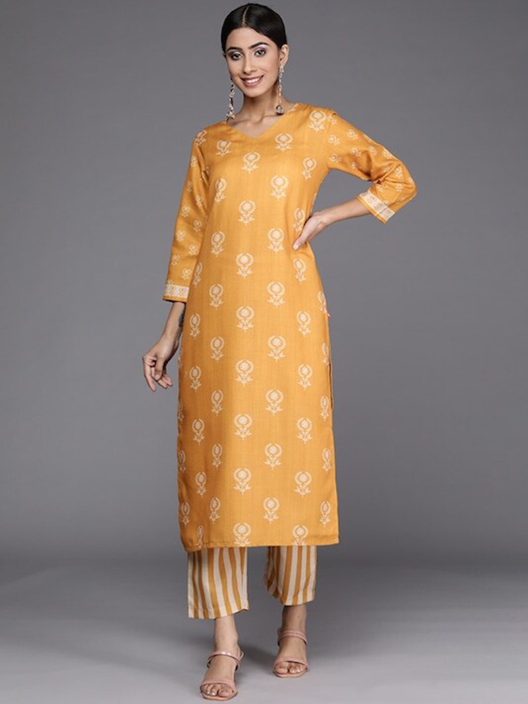 

Varanga Women Mustard Yellow Floral Printed V-Neck Winter Kurta with Trousers