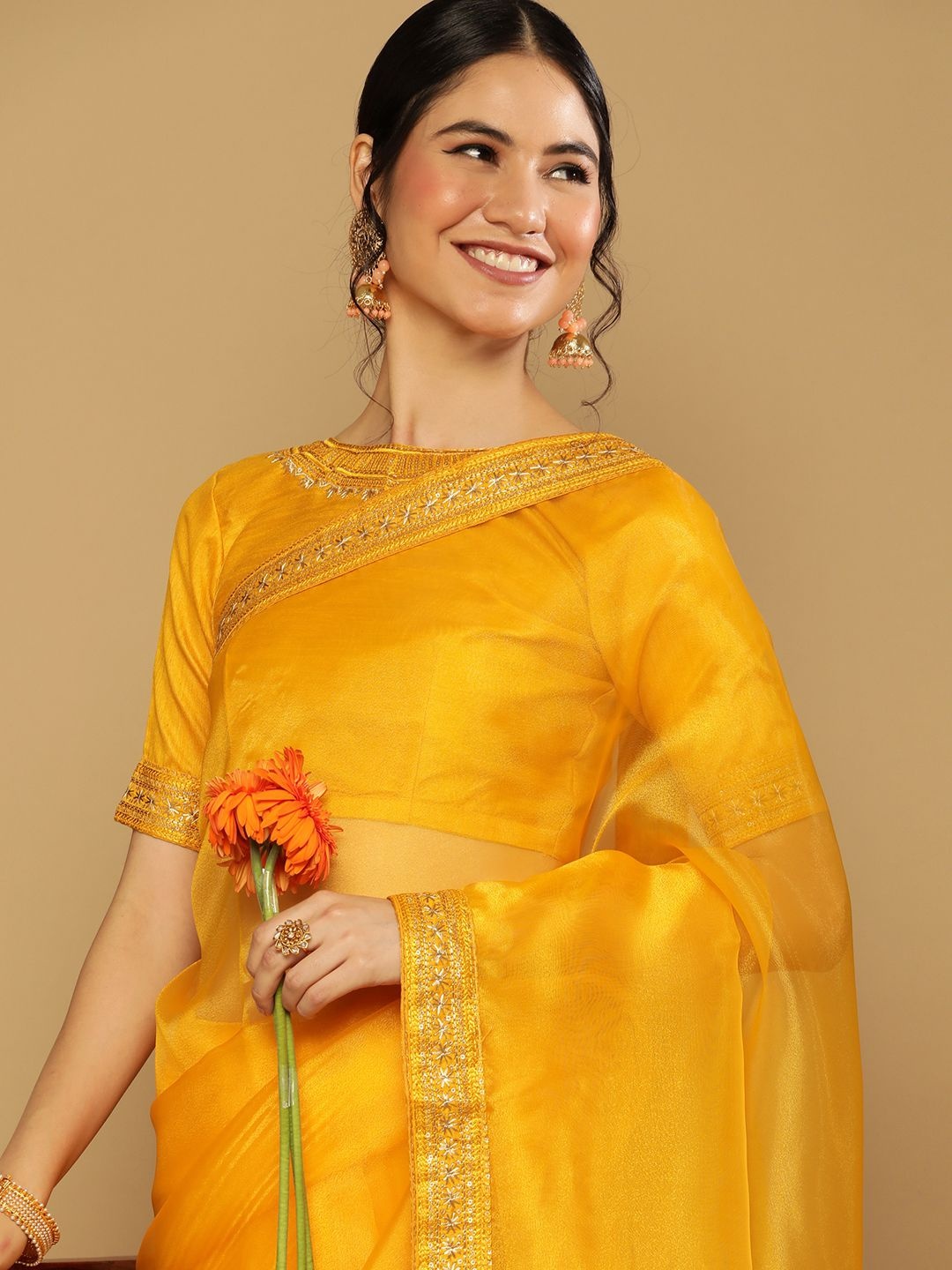

Satrani Women Yellow & Gold-Toned Organza Saree