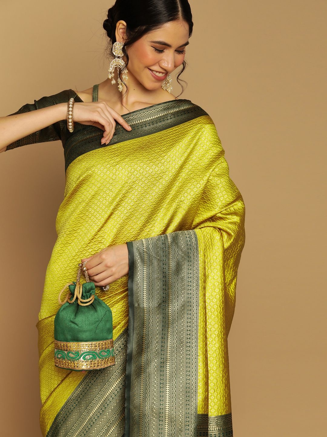 

Satrani Green Ethnic Motifs Zari Art Silk Kanjeevaram Saree