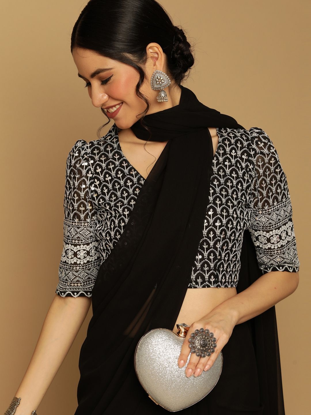 

Satrani Black Georgette Saree