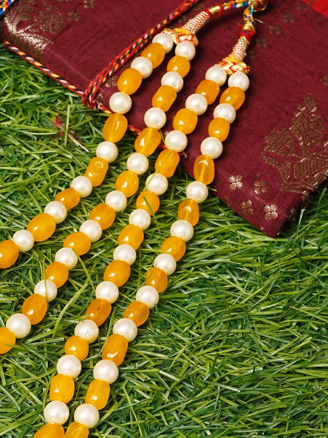 

Unnati Silks Yellow & White Layered Necklace