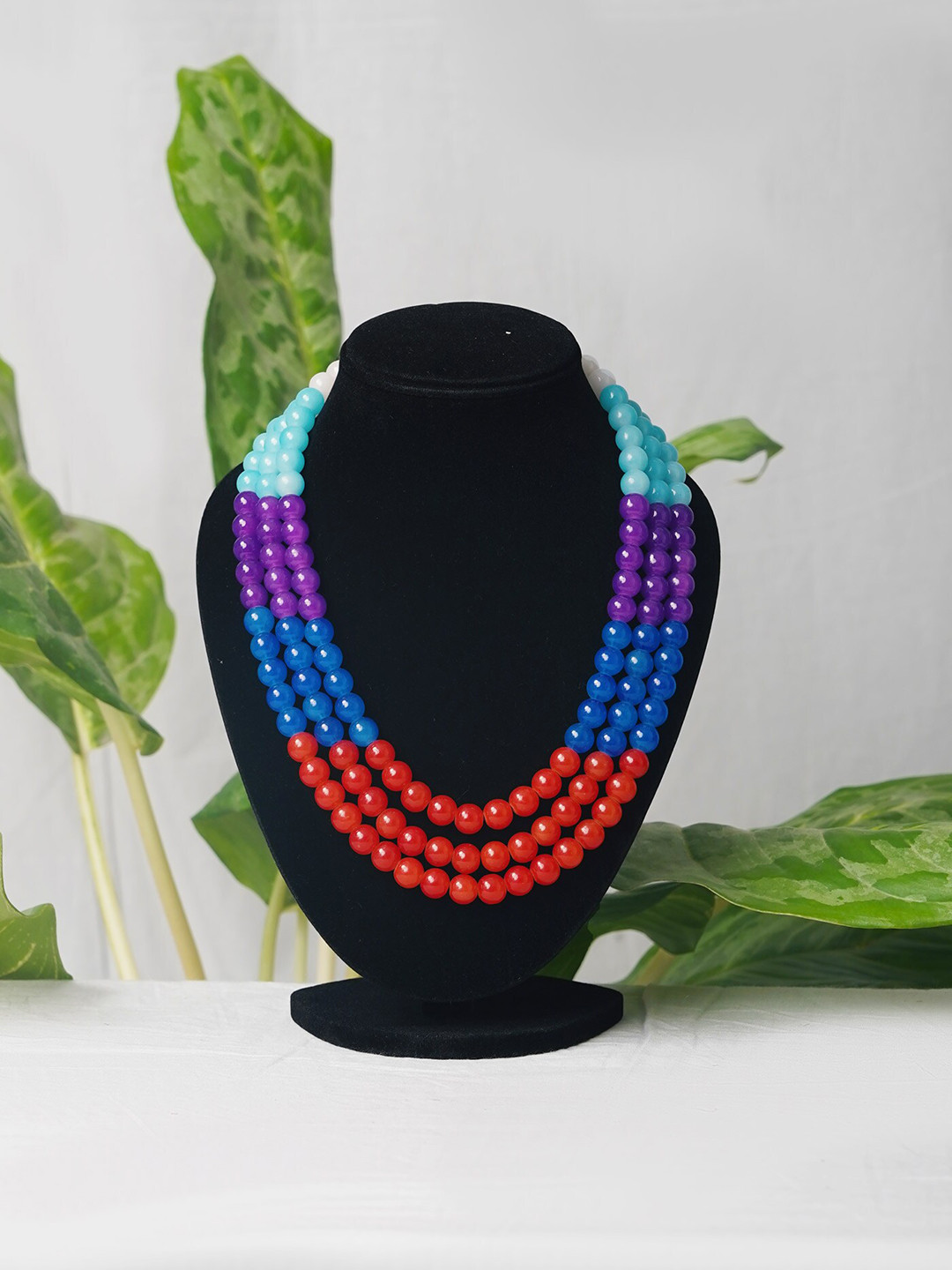 

Unnati Silks Women Blue & Purple Layered Necklace