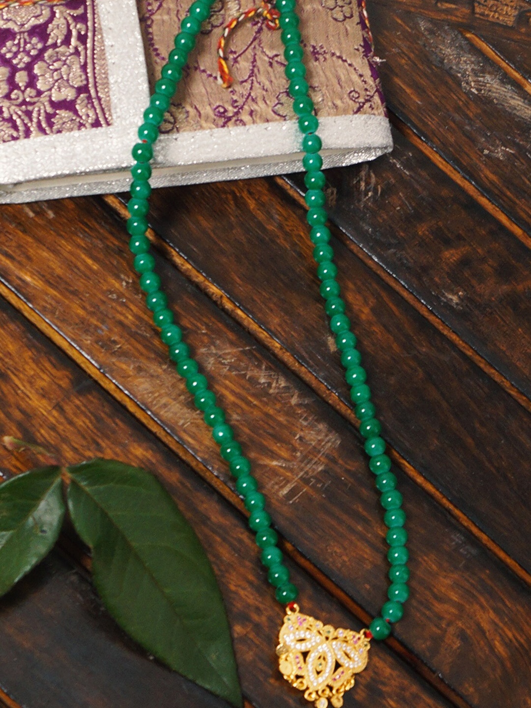 

Unnati Silks Green & Gold-Toned Gold-Plated Necklace