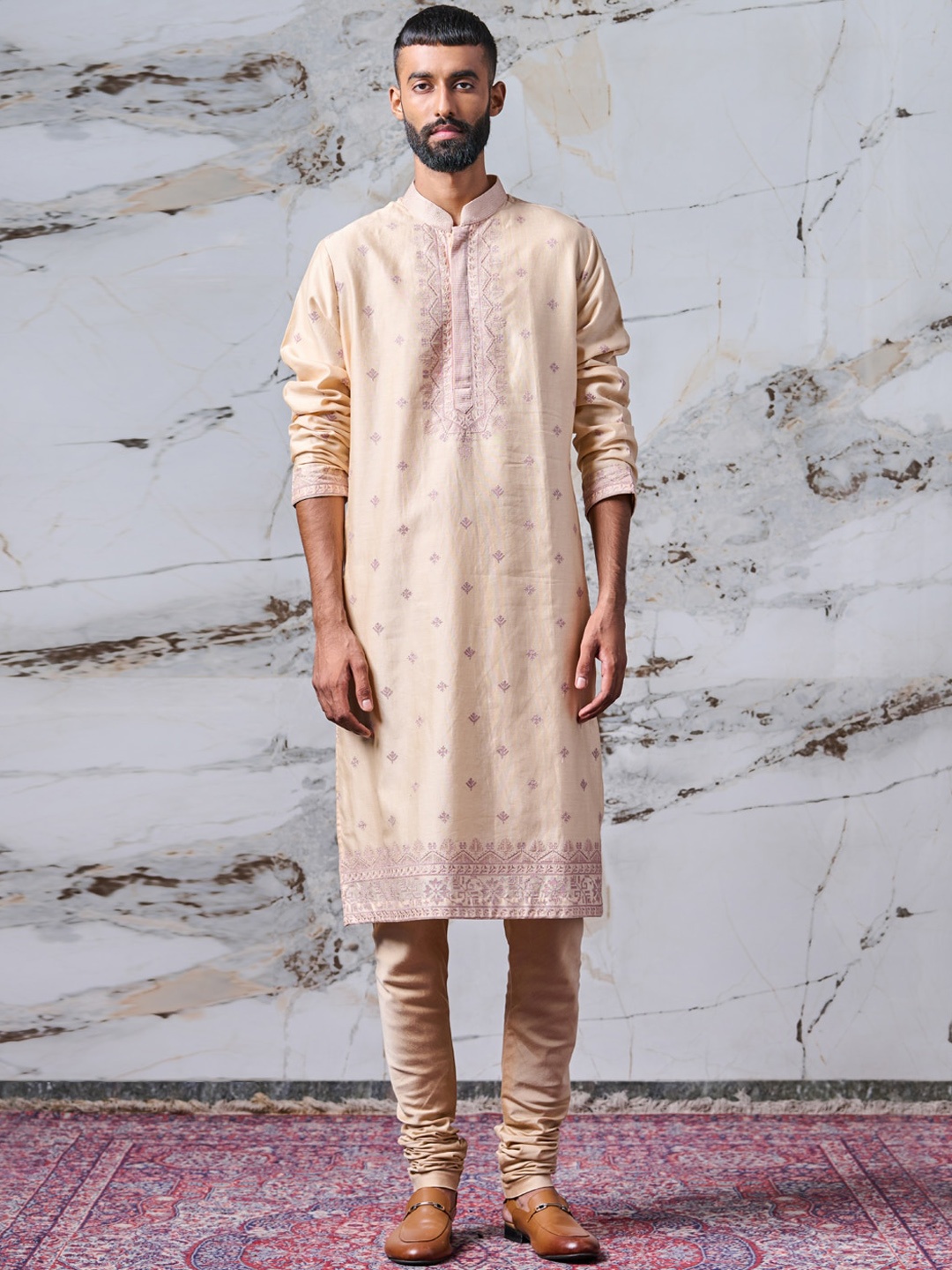 

Tasva Men Beige Ethnic Motifs Embroidered Kurta with Churidar