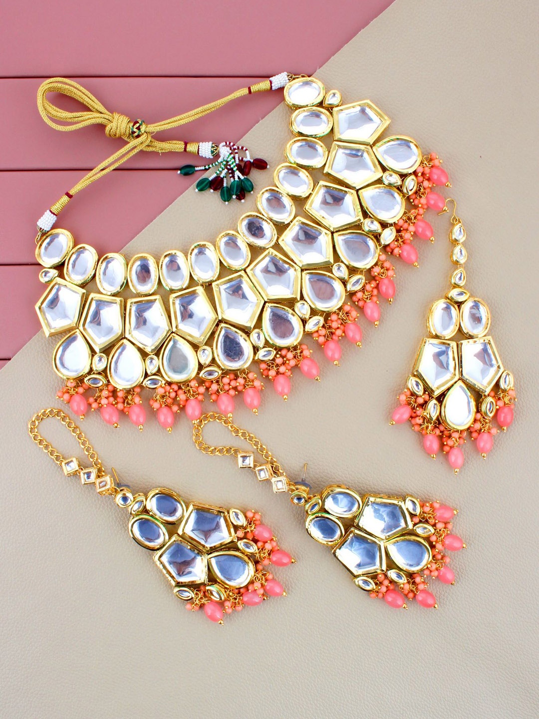 

LUCKY JEWELLERY Gold-Plated Peach & White Kundan-Studded Peach Jewellery Set