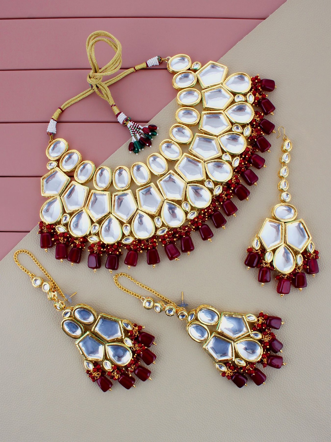 

LUCKY JEWELLERY Maroon Kundan Jewellery Set