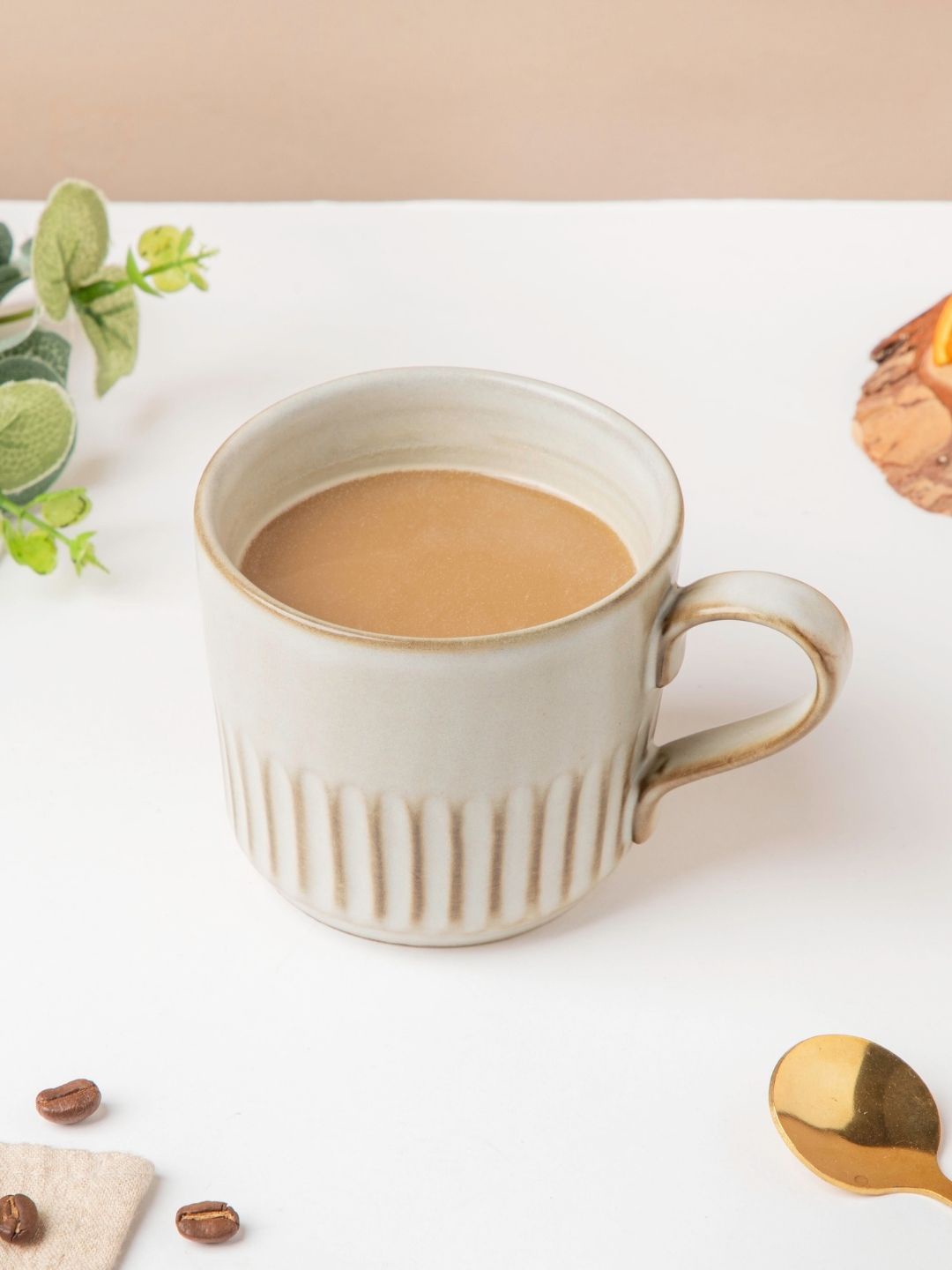 

Nestasia Off White & Brown Textured Ceramic Glossy Cup 200 ml