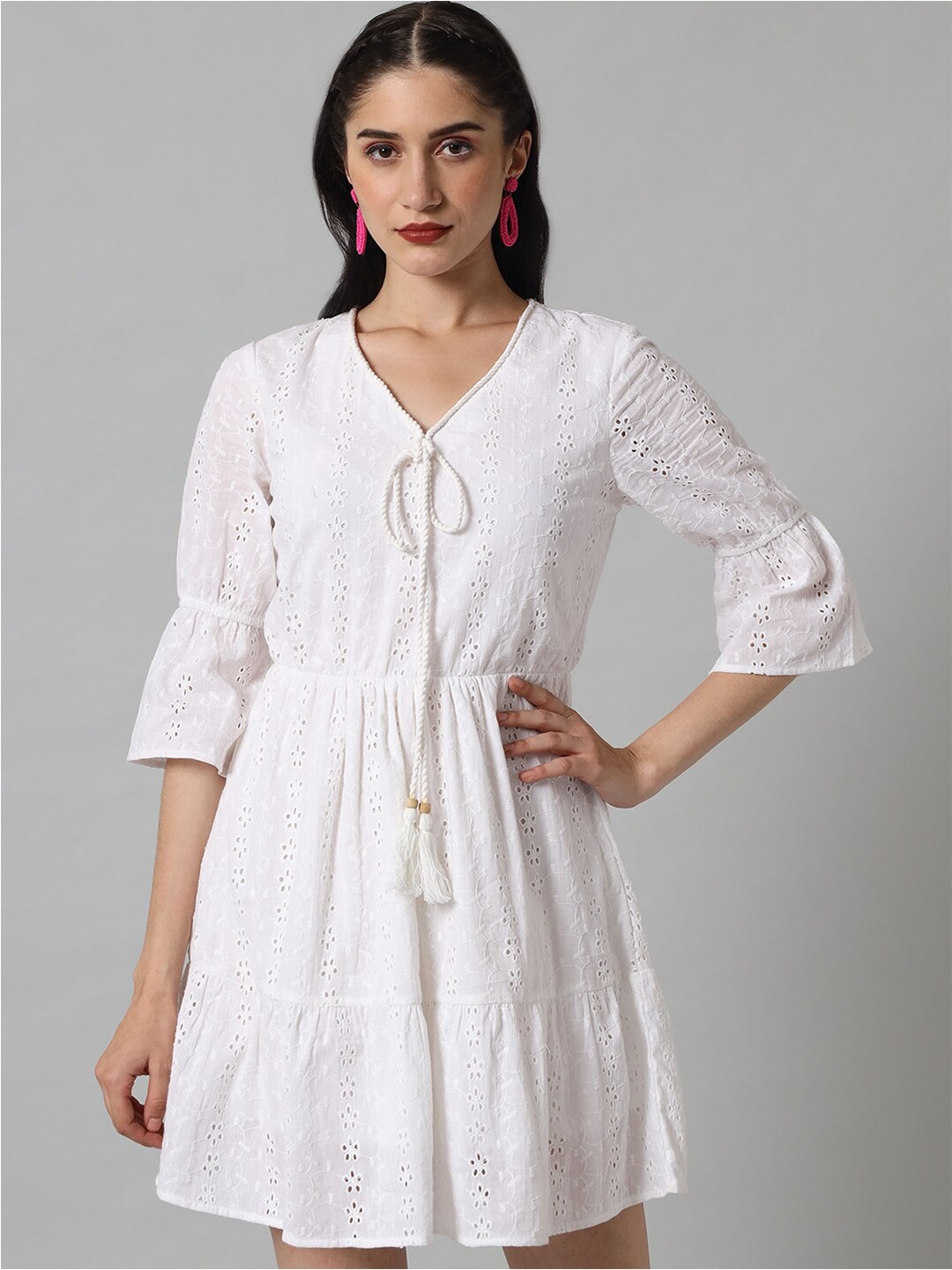 

The Vanca White Schiffli Tie-Up Neck Cotton Mini Tiered Dress