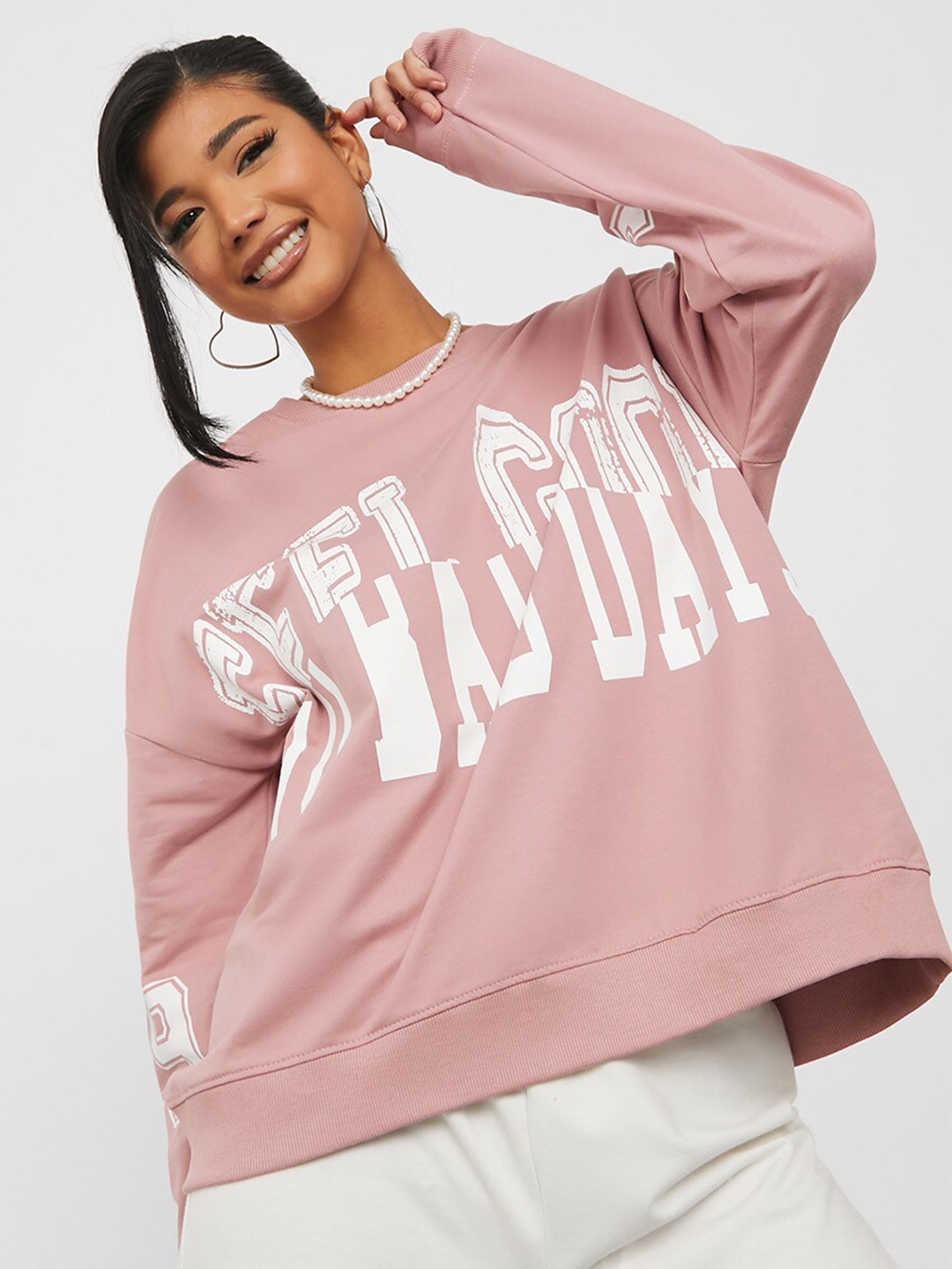 

Styli Women Pink Varsity Print Regular Length Oversized Fit Sweatshirt