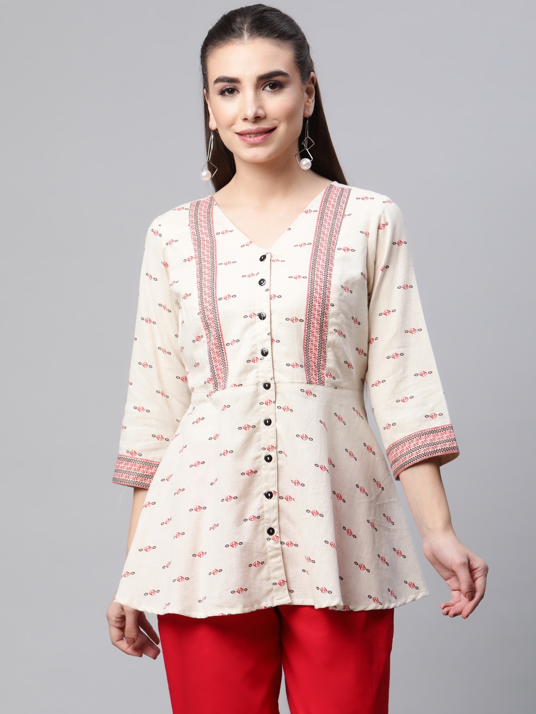 

Ayaany Cream-Coloured & Red Ethnic Motifs Printed A-LineTop