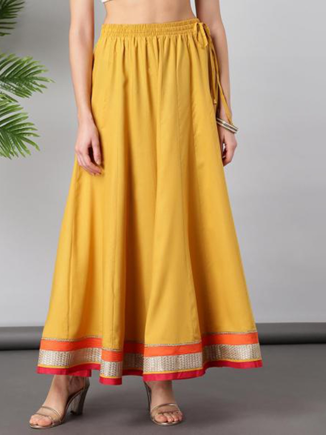 

Lakshita Women Yellow Solid Maxi Flared Skirts