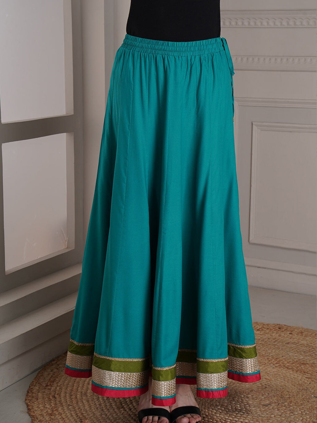 

Lakshita Women Turquoise Blue Solid Flared Skirts