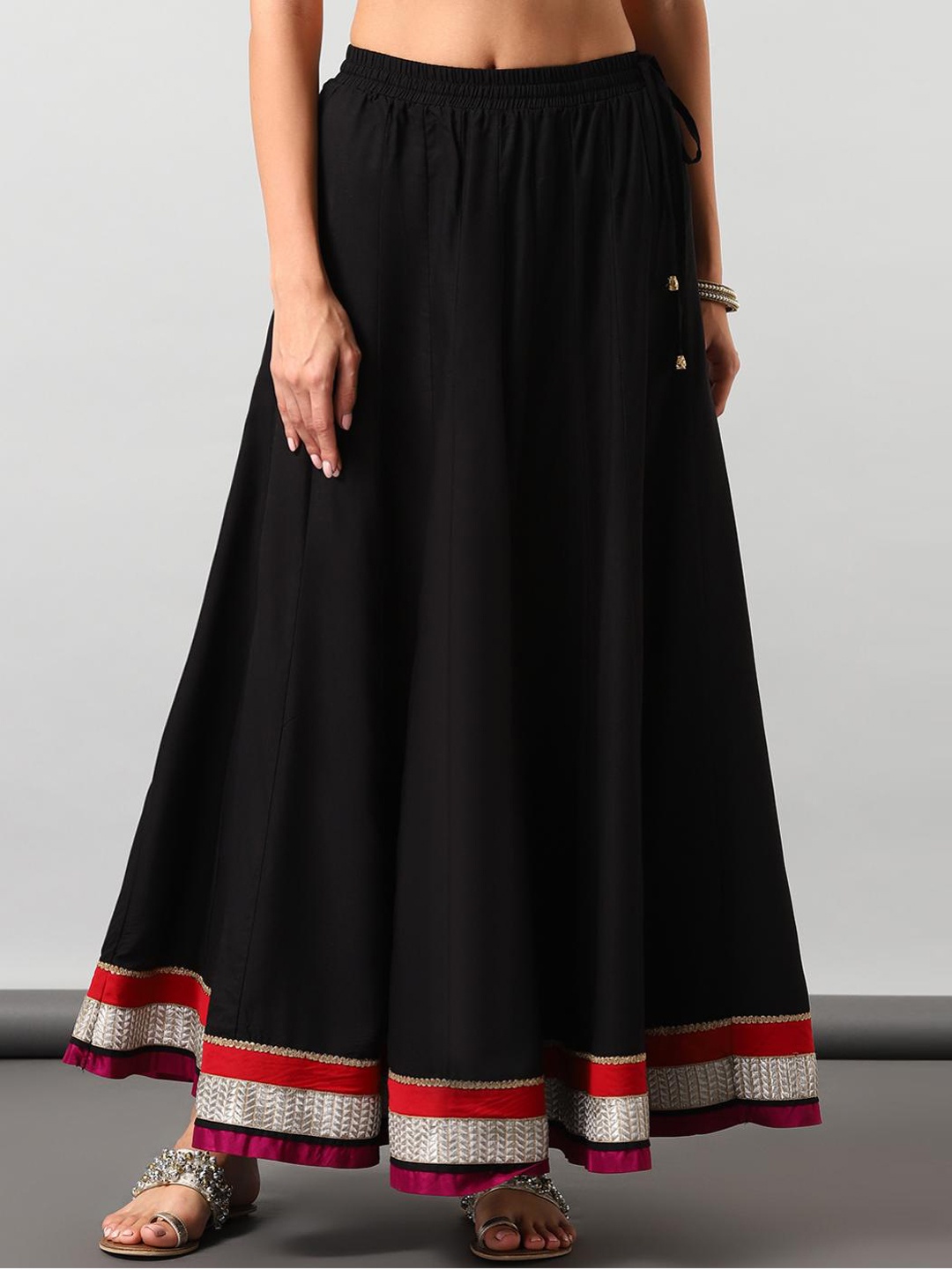 

Lakshita Women Black Solid Flared Maxi Skirts