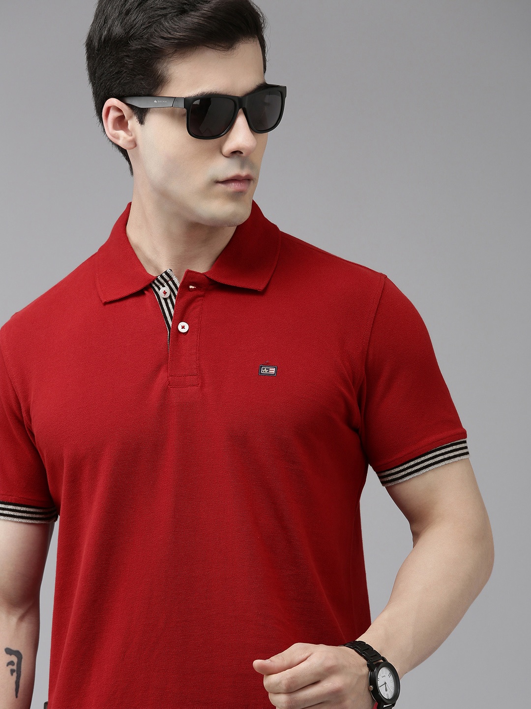 

Arrow Men Solid Polo Collar Knitted Pure Cotton T-shirt With Minimal Embroidered Detail, Red