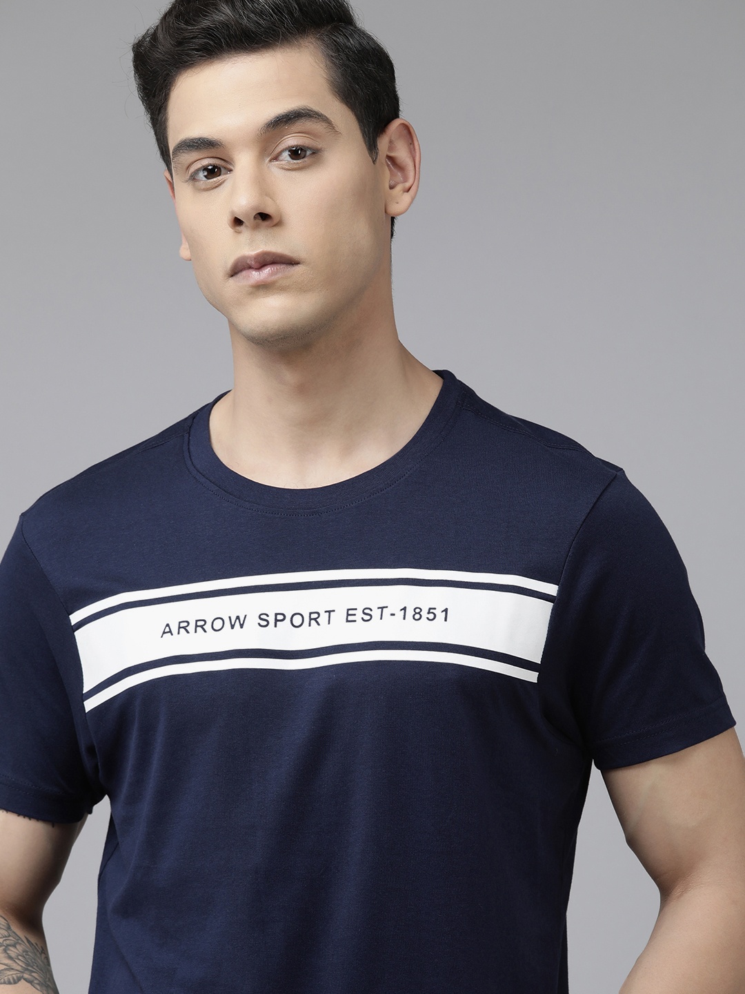 

Arrow Men Navy Blue & White Brand Logo Printed Pure Cotton T-shirt
