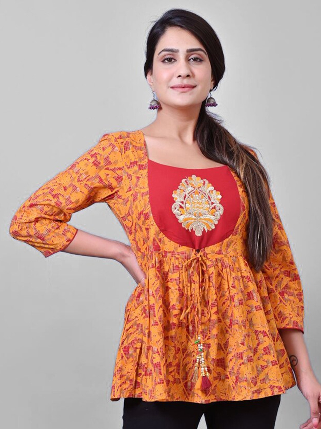 

PRAKRTEE Women Mustard Yellow Print Embroidered Empire Top